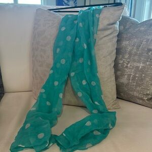 Teal & white polka dot scarf.